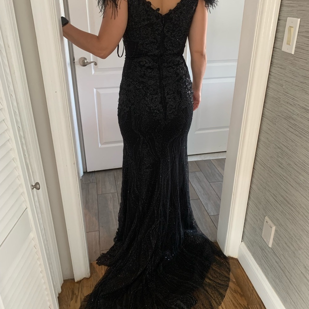 Gorgeous black gown from nyc glamour. Size 4 had it slightly shortened in front